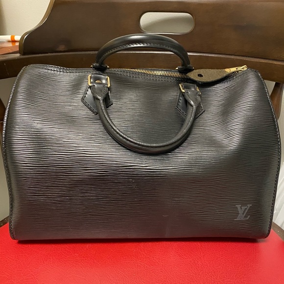 Louis Vuitton Handbags - 1 day sale ⭐️Louis Vuitton Epi Speedy 30 black